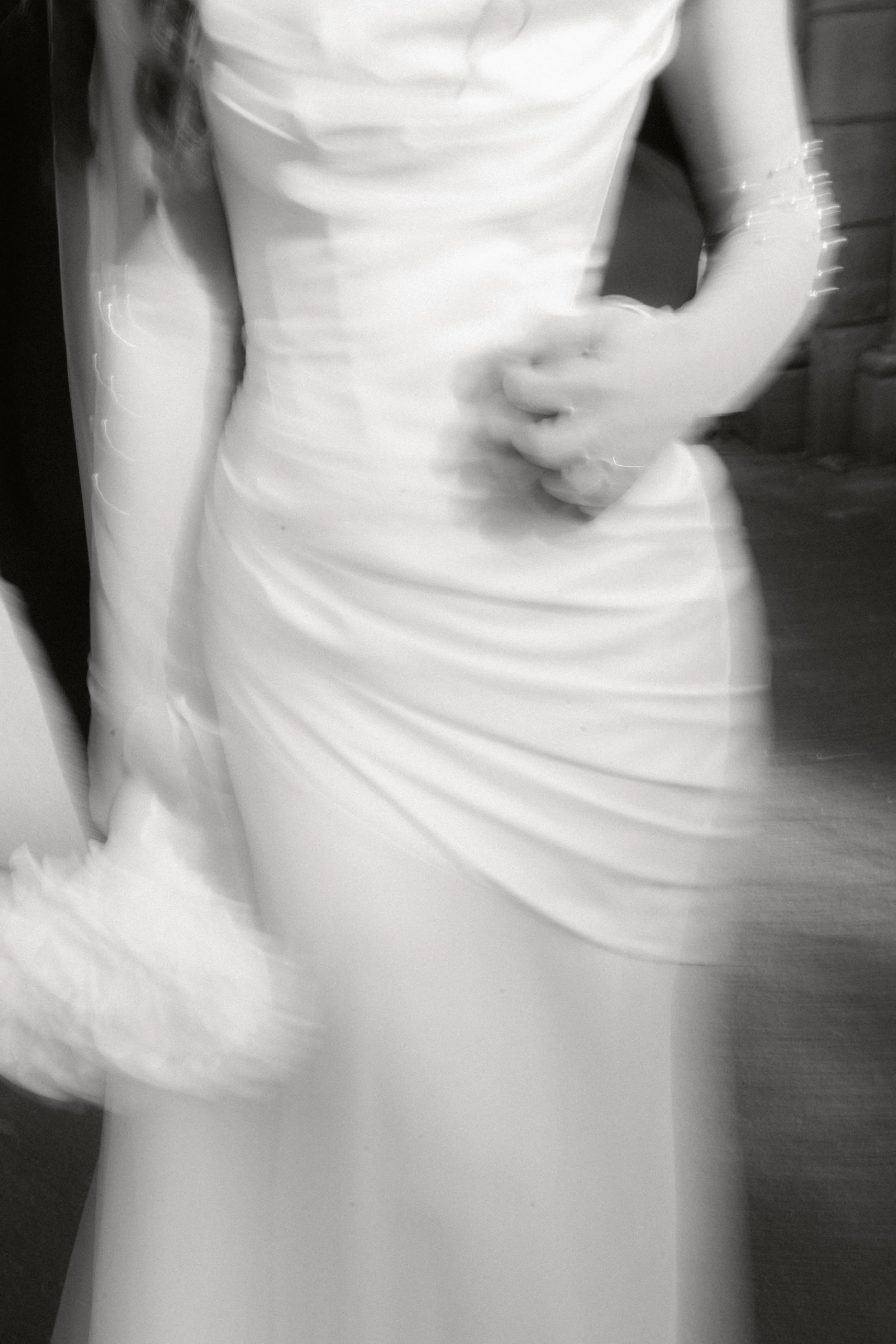 Editorial bridal portrait in motion captured by a wedding photographer in the Stuttgart area.