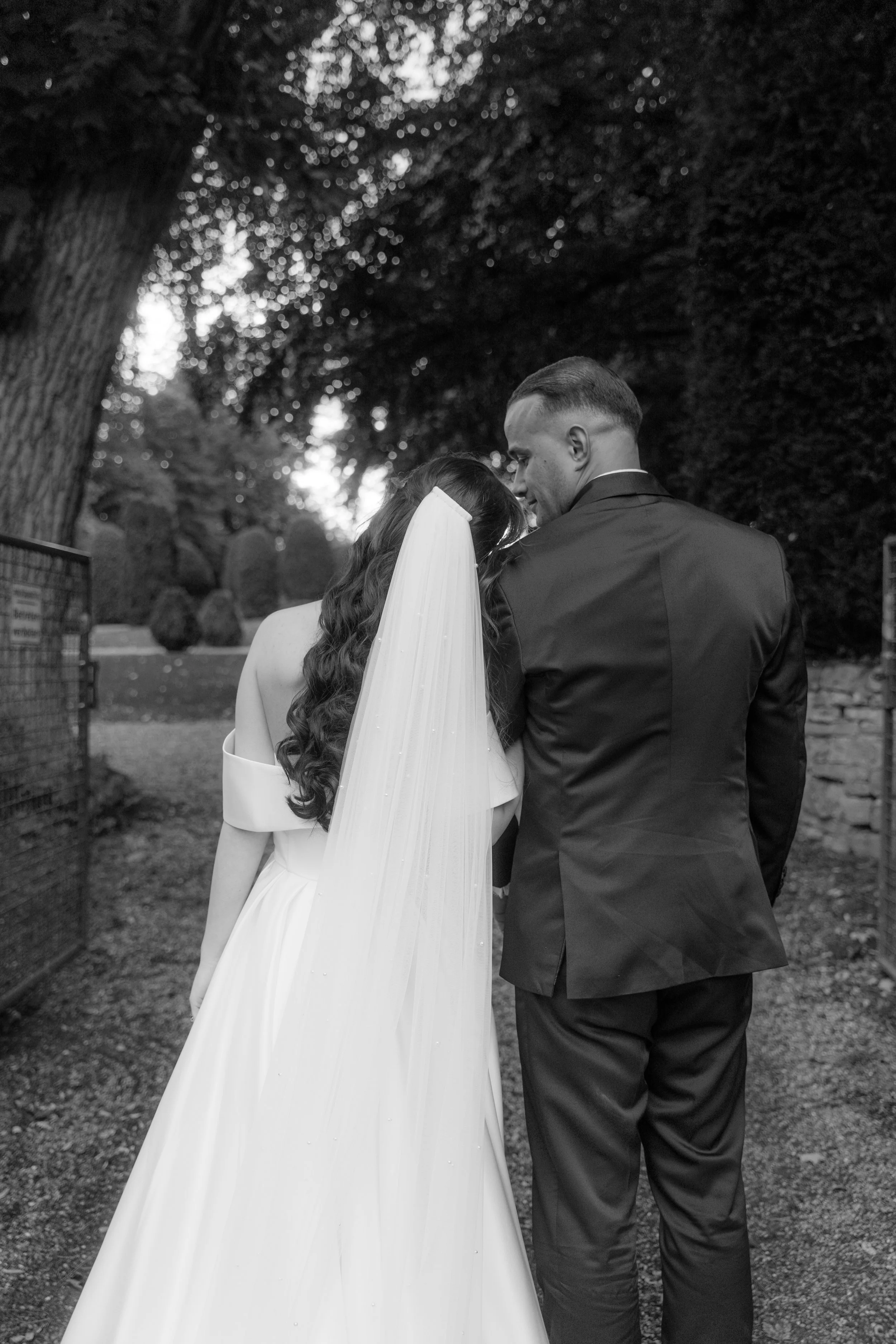 Bride and groom walking together after their wedding ceremony, captured by Europe wedding photographer Änna Photography.