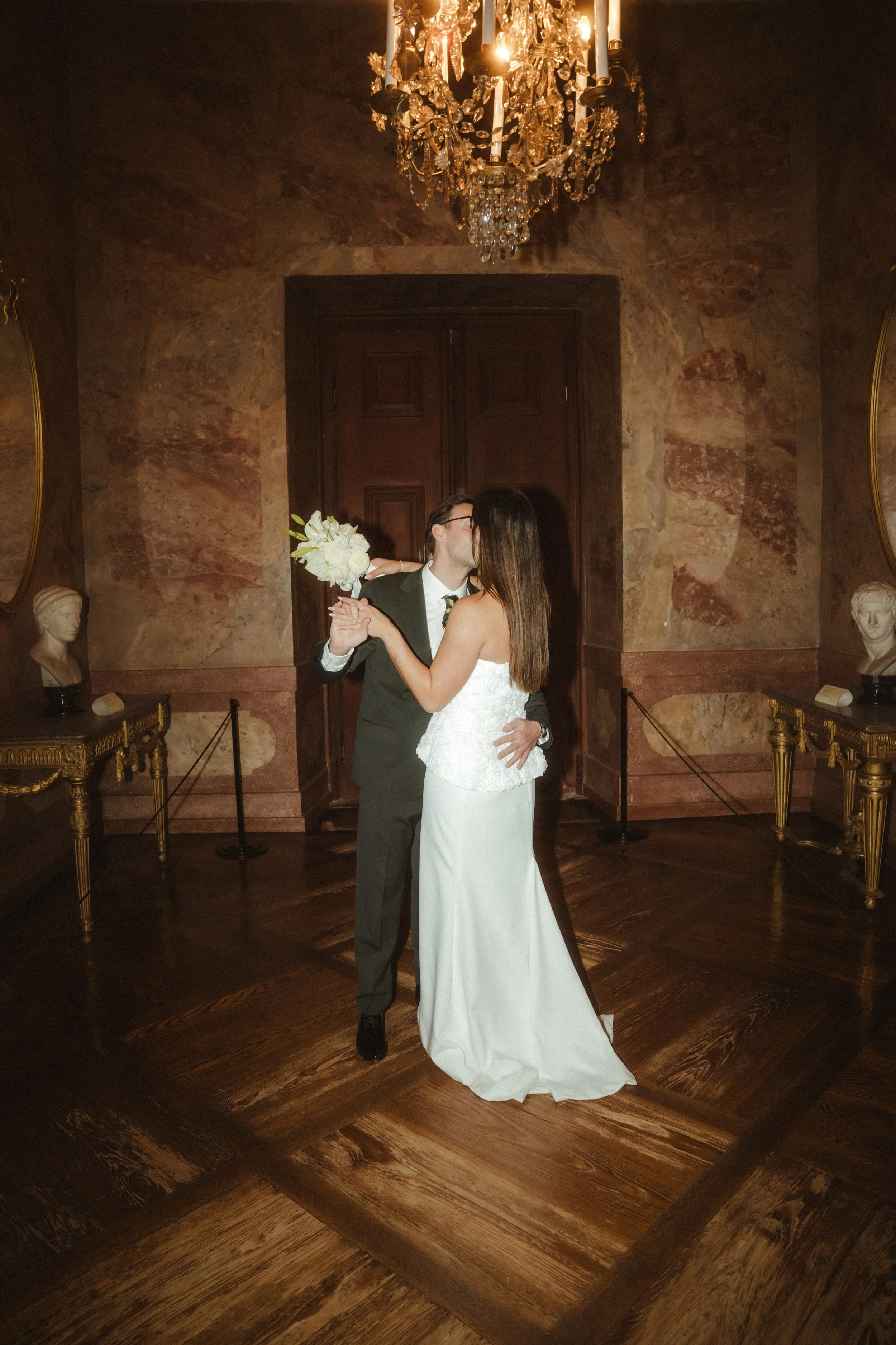 Bride and groom sharing their first dance at a luxury wedding reception, photographed by Europe wedding photographer Änna Photography.