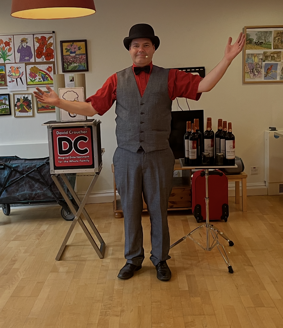 Magician David Croucher stands in a care home