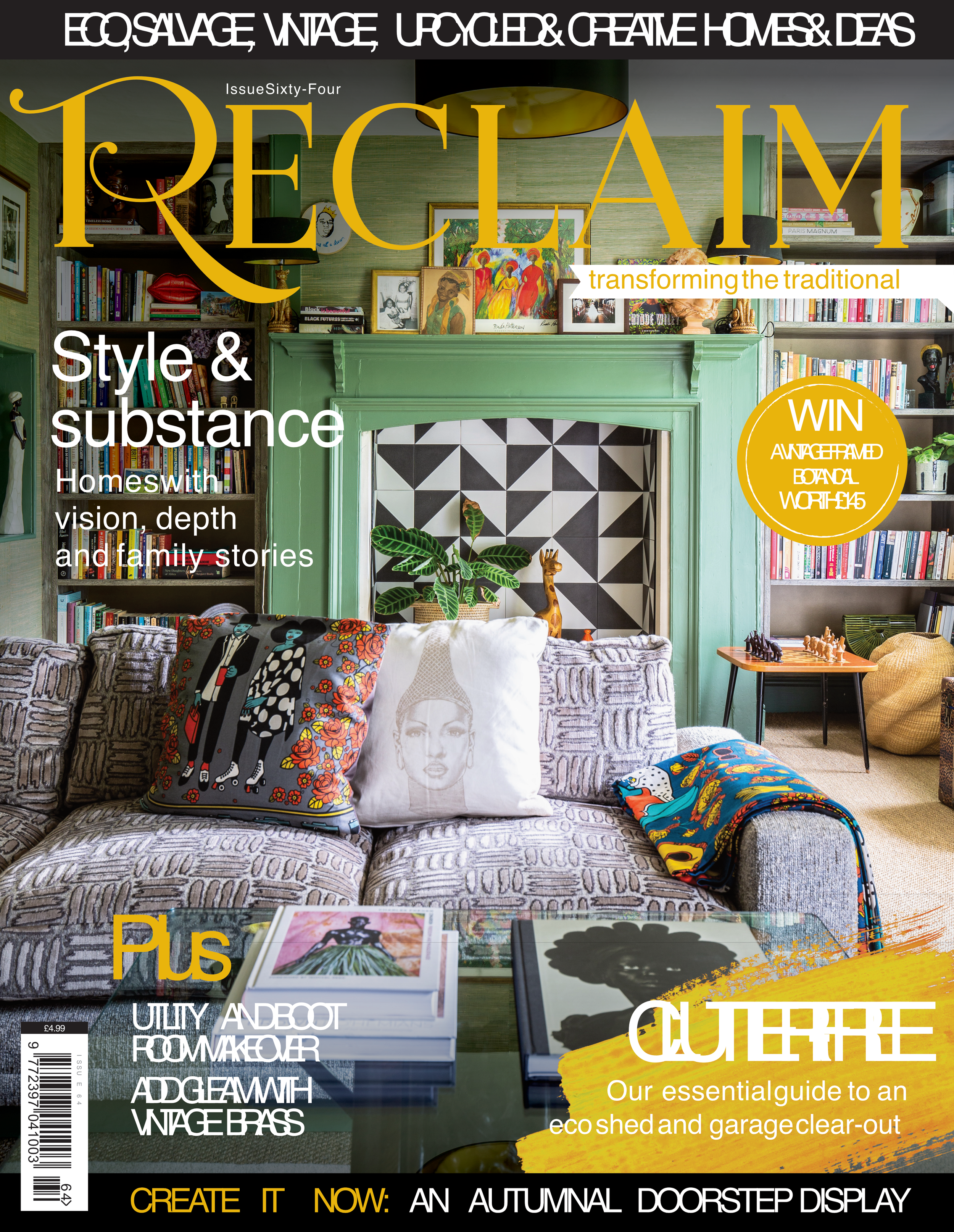 Cover of a magazine titled 'Reclaim' with a subtitle about transforming the traditional into style and substance, featuring a cozy living room with bookshelves, colorful artwork, a green fireplace, and various decorative objects, promoting an eco-minded garage clear-out.