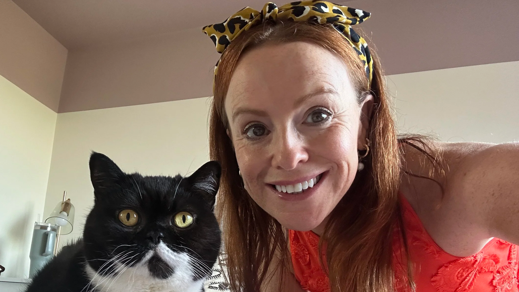 Emily with a black and white cat – cat sitter in Walthamstow