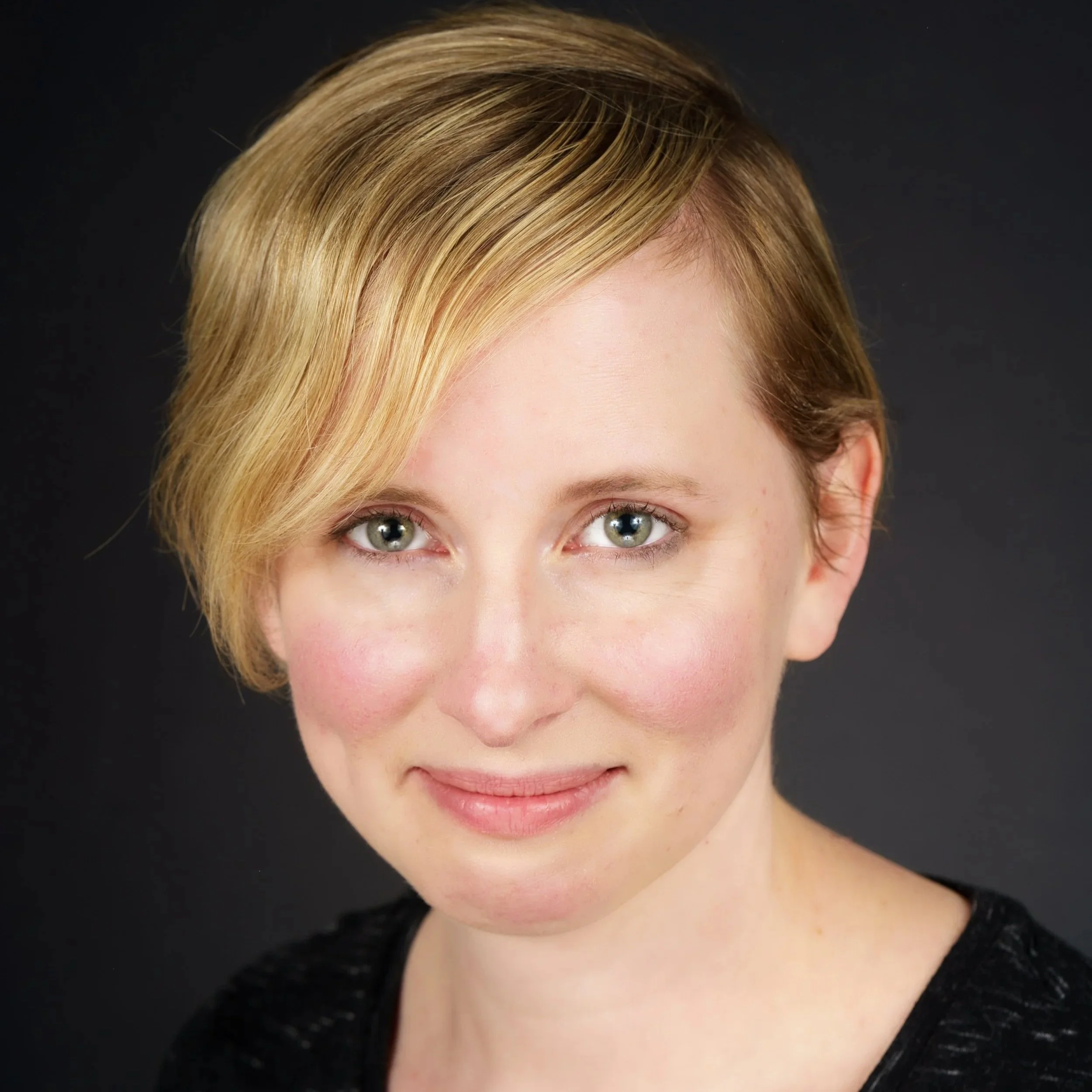 Professional headshot of woman in studio client review