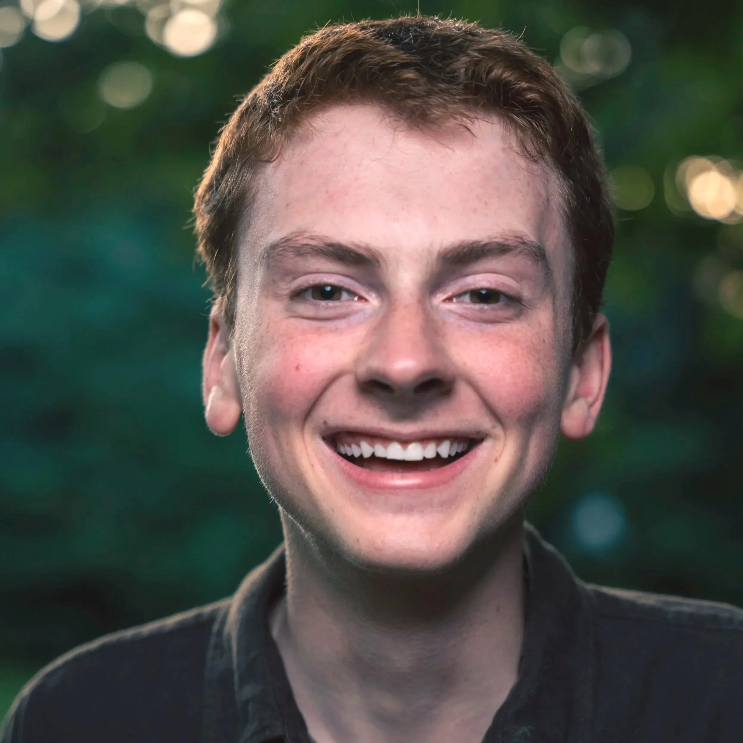 High School Senior portrait outdoors young man