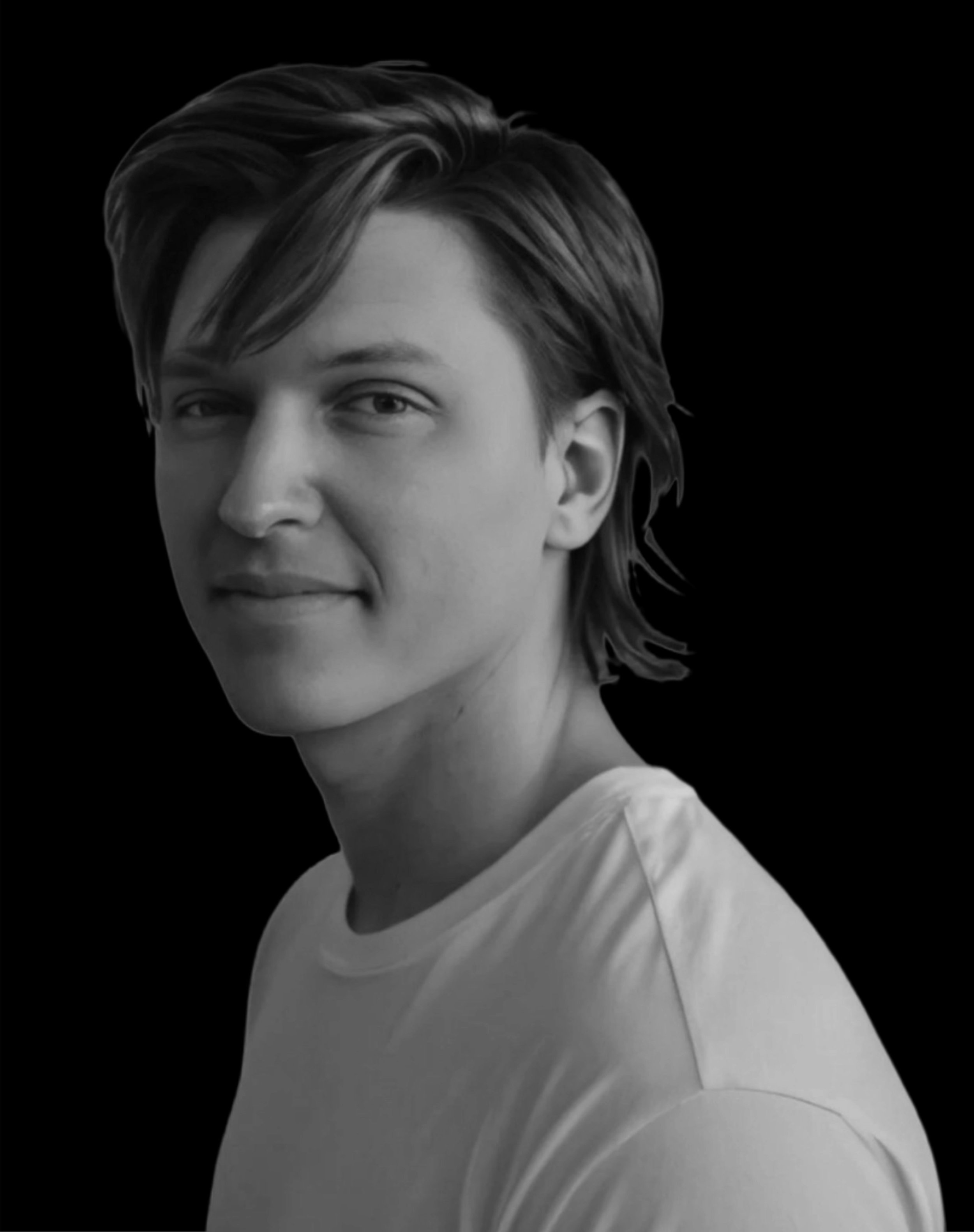 Black and white portrait of a young man with medium-length hair, wearing a casual t-shirt, against a dark background.