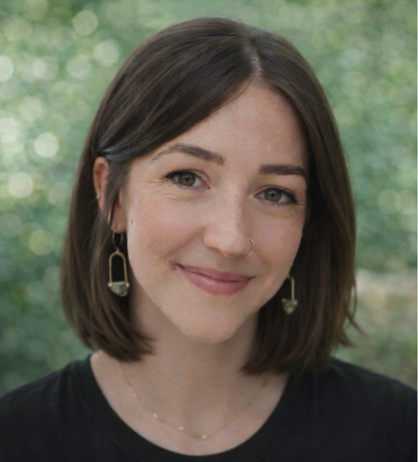 A birth doula smiling