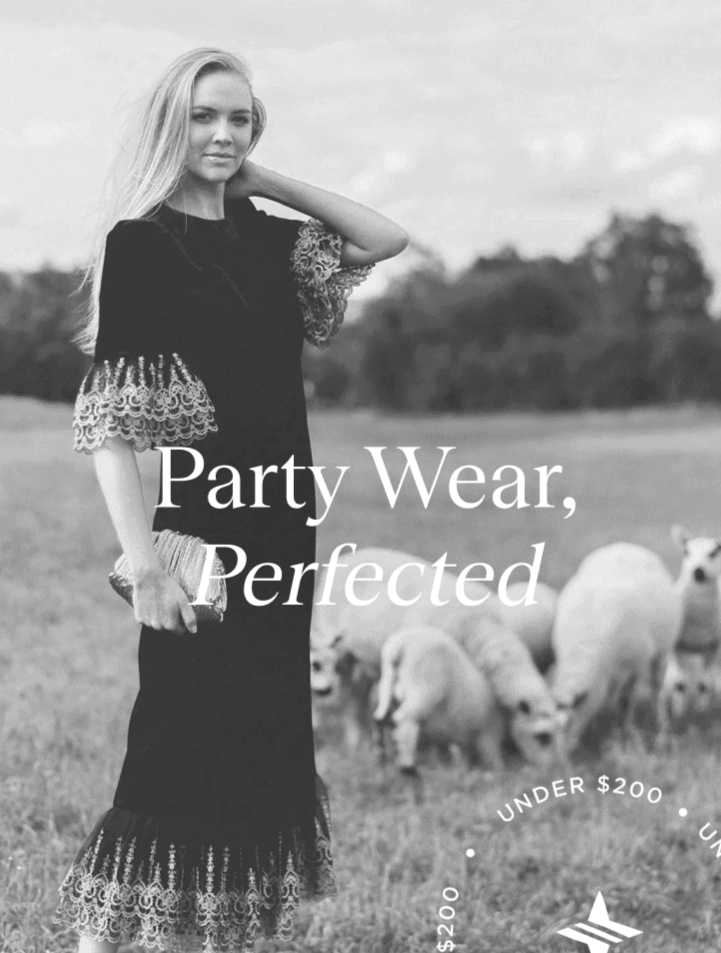 A woman in a black dress with lace details on the sleeves and hem, standing outdoors in a field with sheep in the background, holding a clutch purse, with overlay text promoting party wear under $200.