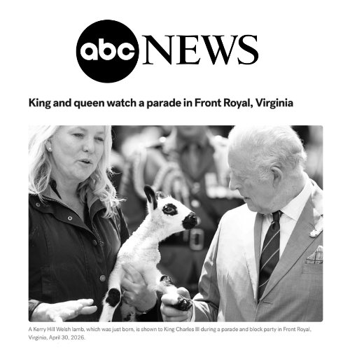 Tracy Bloom and King Charles III discussing a lamb in Front Royal Virginia.