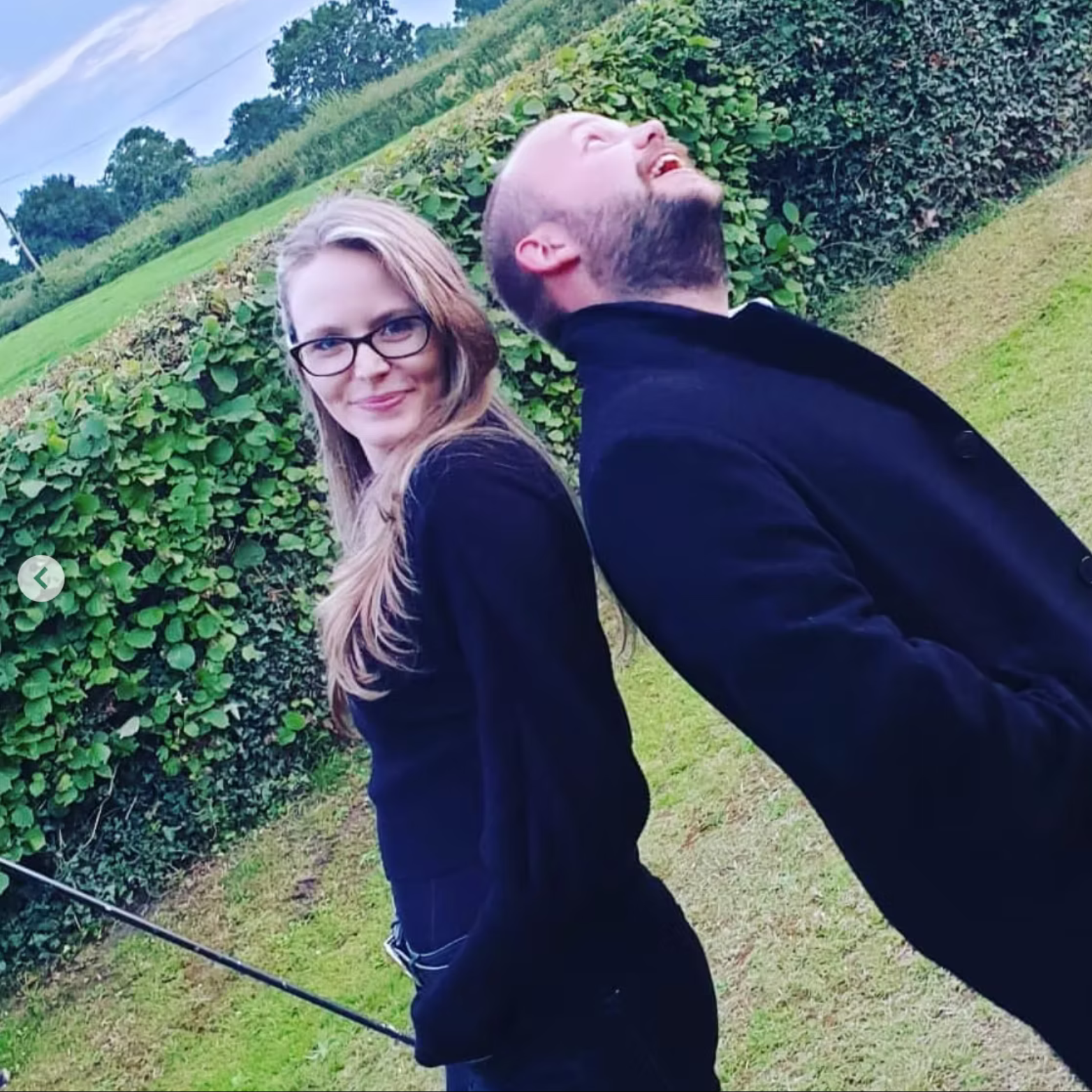 Kay Acoustic acoustic duo backstage moment with guitarist, laughing and enjoying a private function event while providing live wedding and event entertainment.