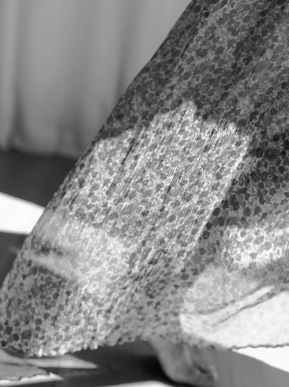 Close-up of a fish with textured, patterned skin, resting on a surface.