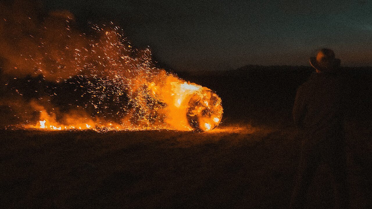 The Flaming Wheel Song: A layered pagan song for justice and ending empire