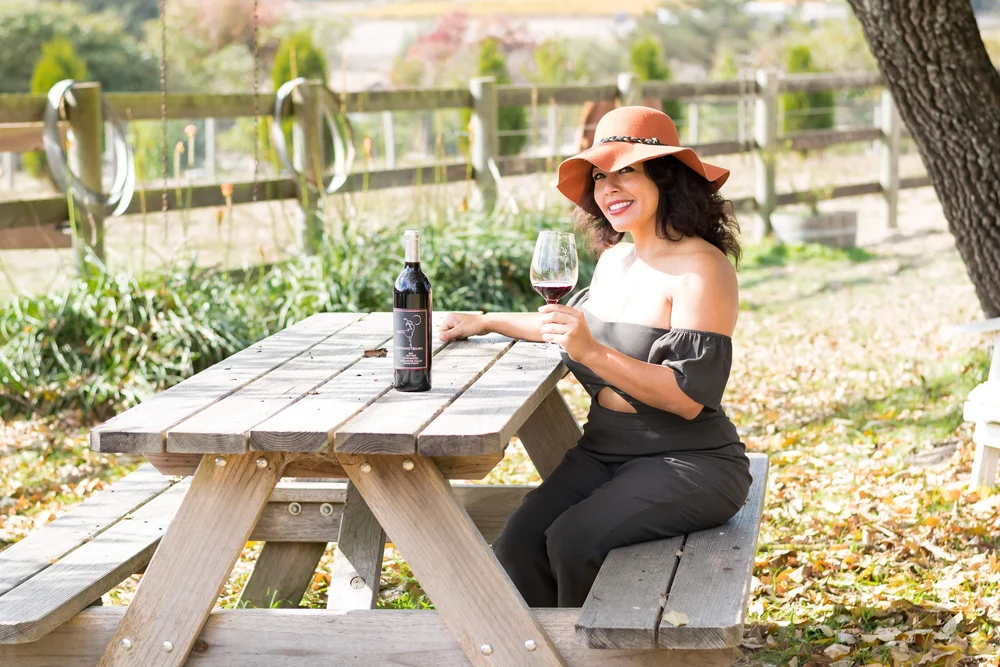 Frances Gonzalez, founder of Vegan Wines and a vegan wine curator since 2016, tasting at Moondance Cellars Winery in California