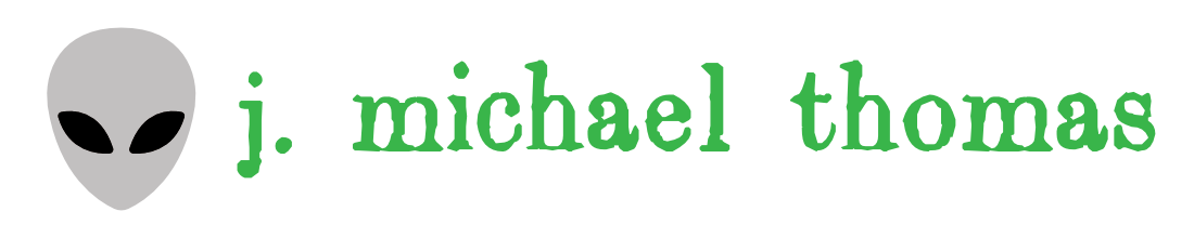 Alien head icon next to the text 'j. michael thomas' in green font.