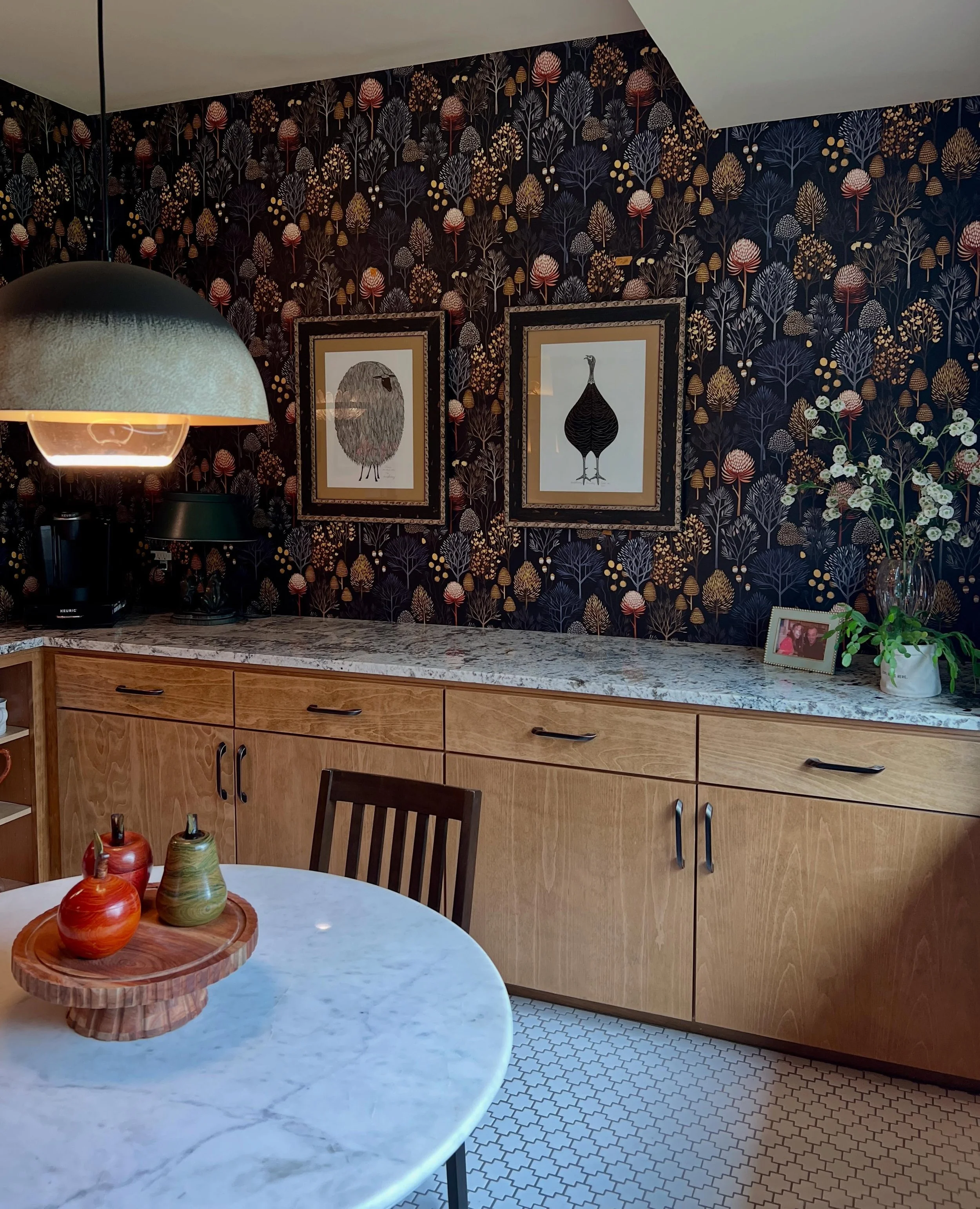 Is there really anything better than a cozy breakfast nook? Situated in front of a large window overlooking the backyard, this breakfast space brings charm and space to share a cup of coffee at the start of your day.