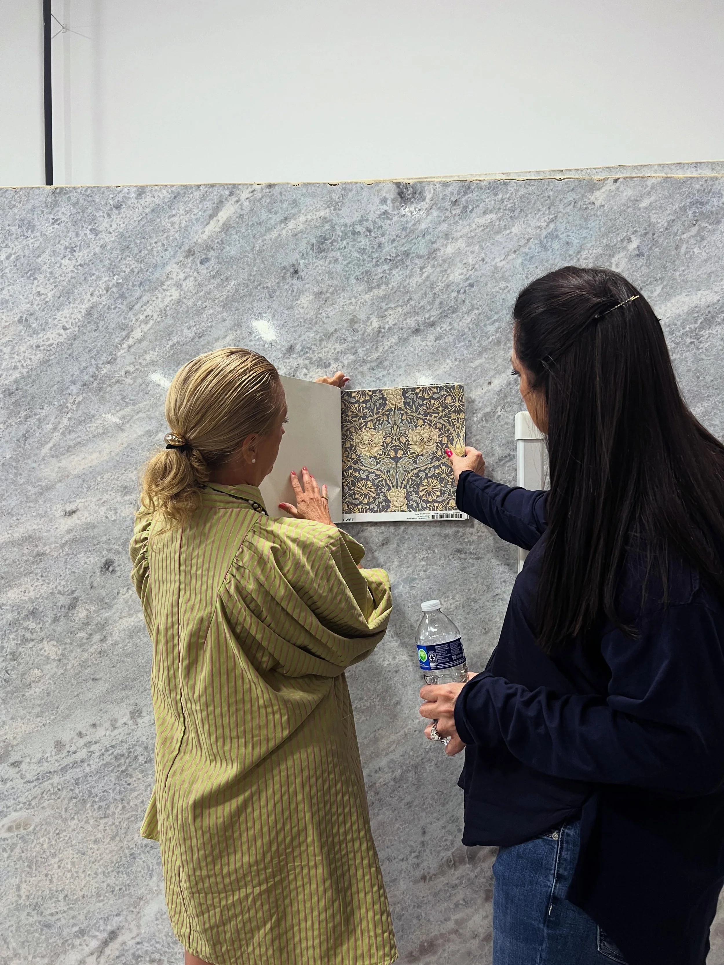 Having fun with our sweet client picking out countertops!