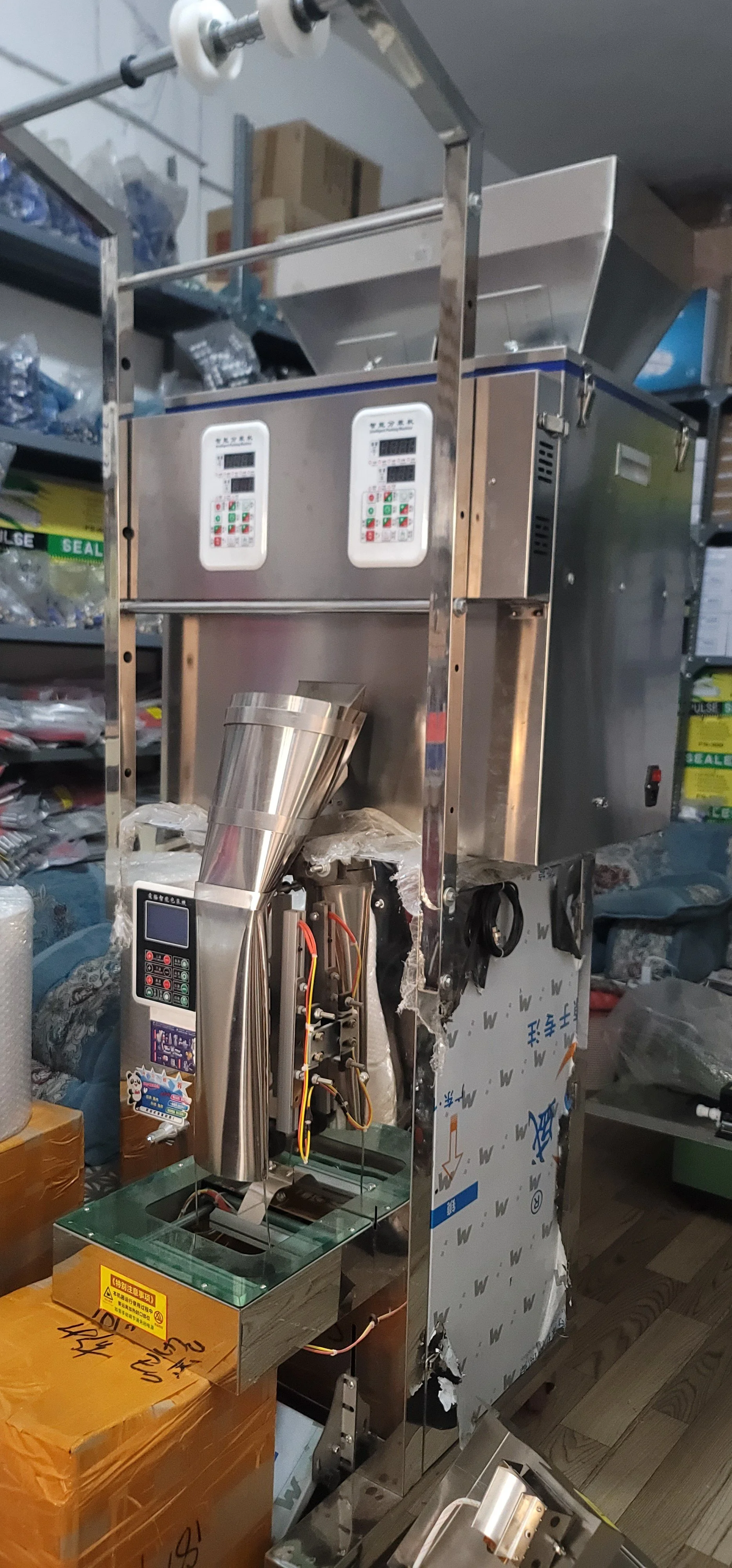 مكينة تعبئة وتغليف وزن جرامي رأسين 500 جرام  (2).jpg