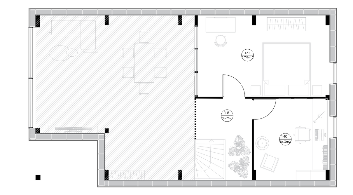Floor plan of a house with multiple rooms including a living room, dining area, bedroom, home office, and staircase, with various furniture and fixtures.