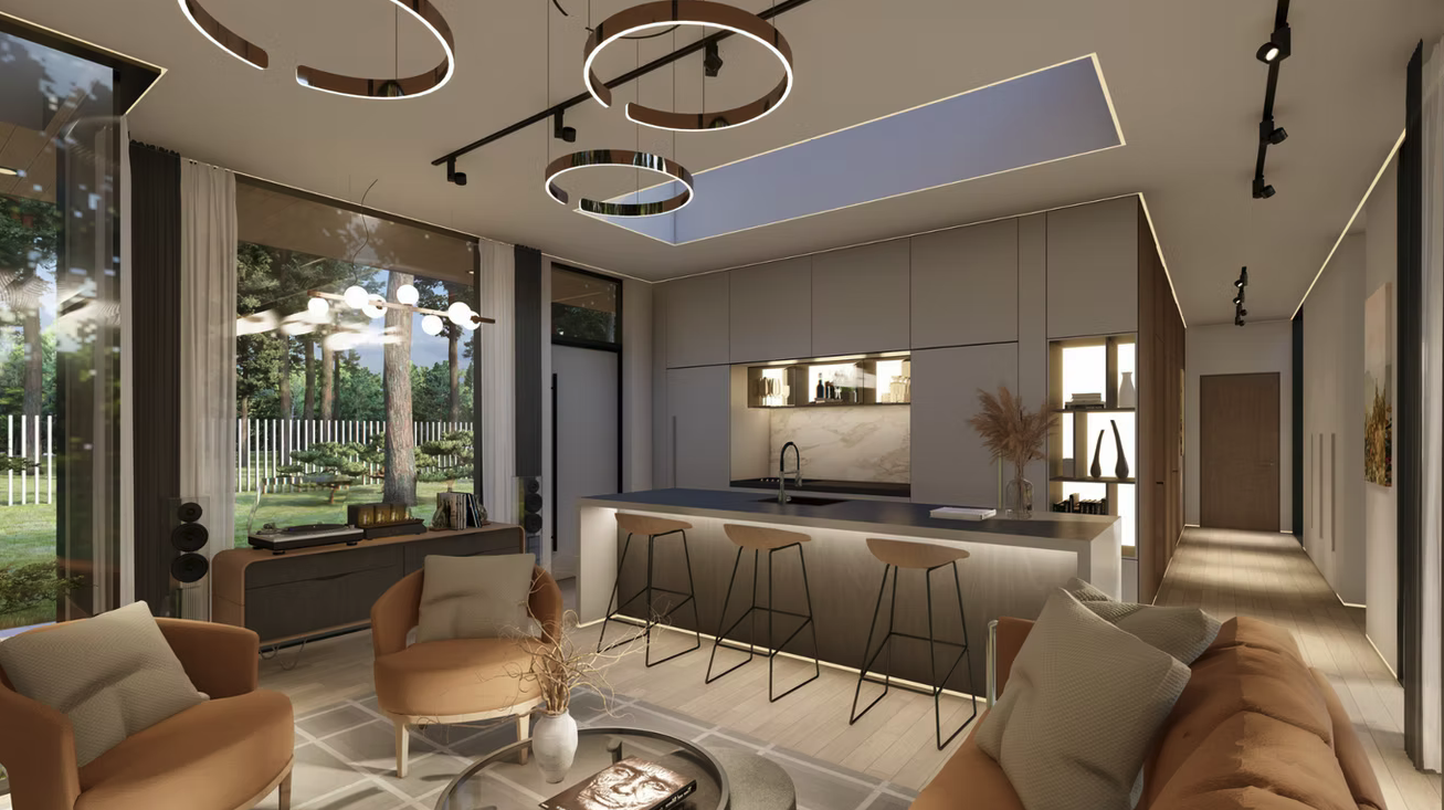 Modern open-concept living room and kitchen area with large windows overlooking a wooded outdoor space, featuring neutral tones, contemporary furniture, and stylish lighting fixtures.