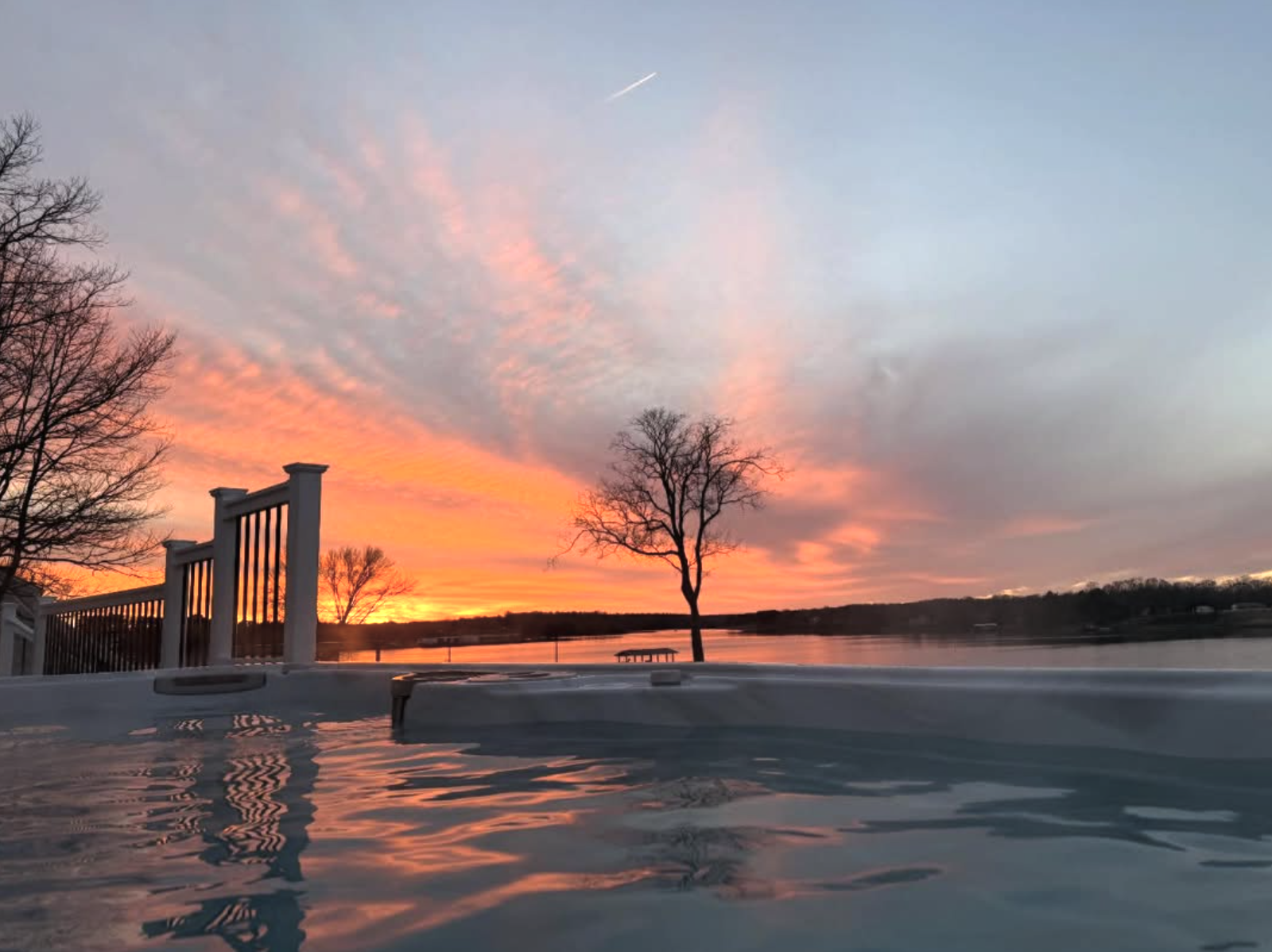 Sunset over the water, viewed from the 17 ft long swim spa.