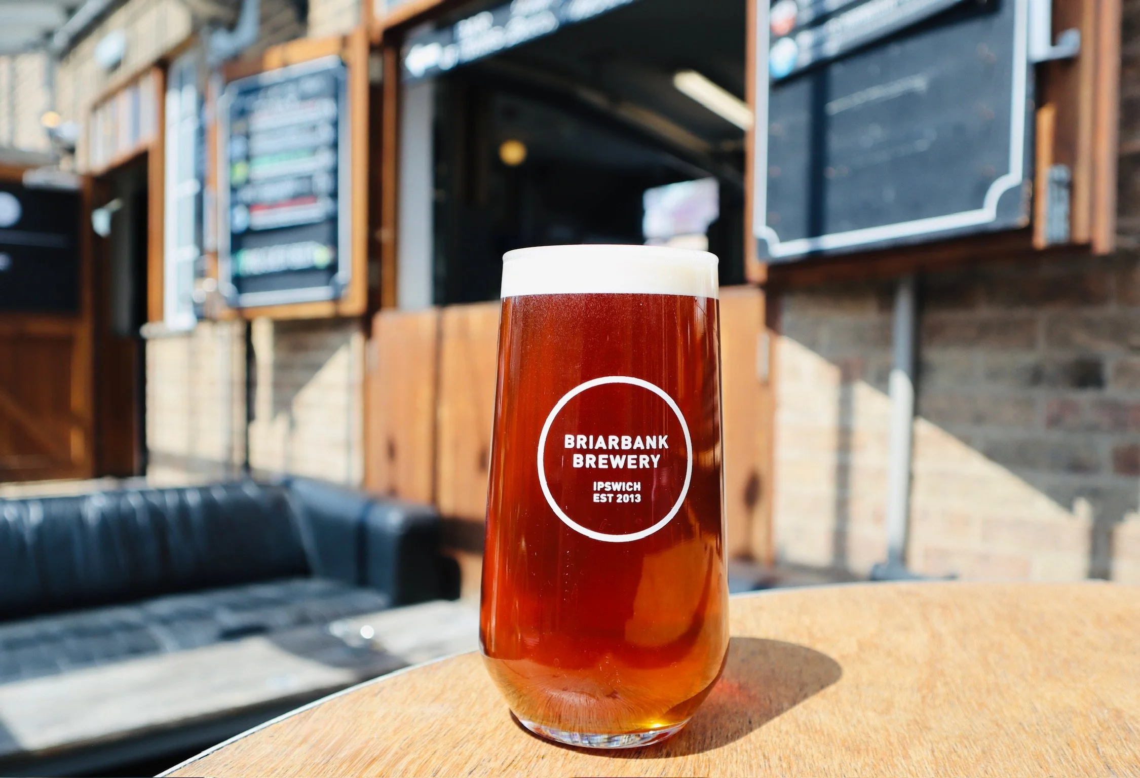One of the Briarbank beers situated on a table outside the brewery