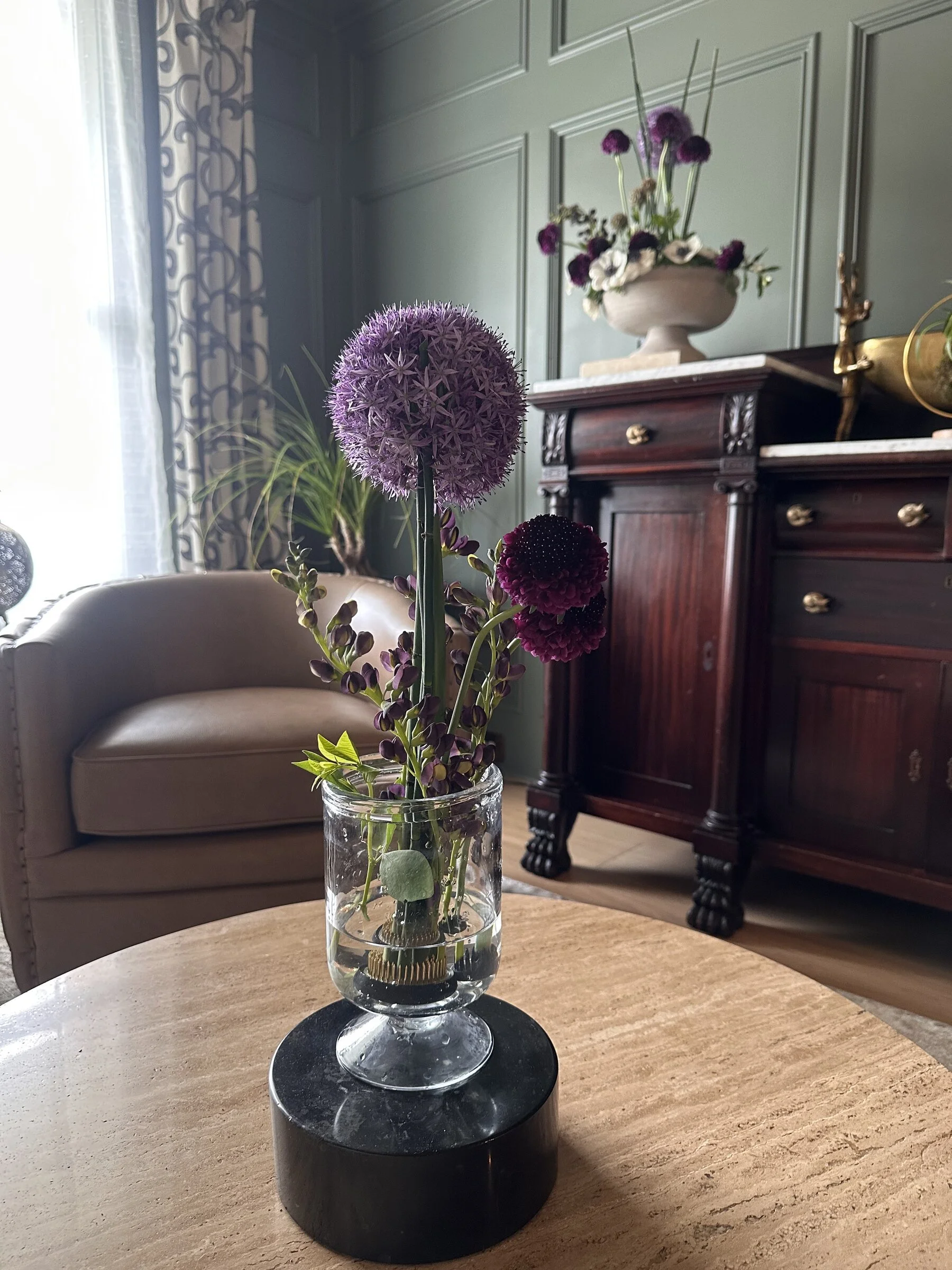 Purple allium arrangement in a glass vase, Botanical Studio by Kelly Eileen