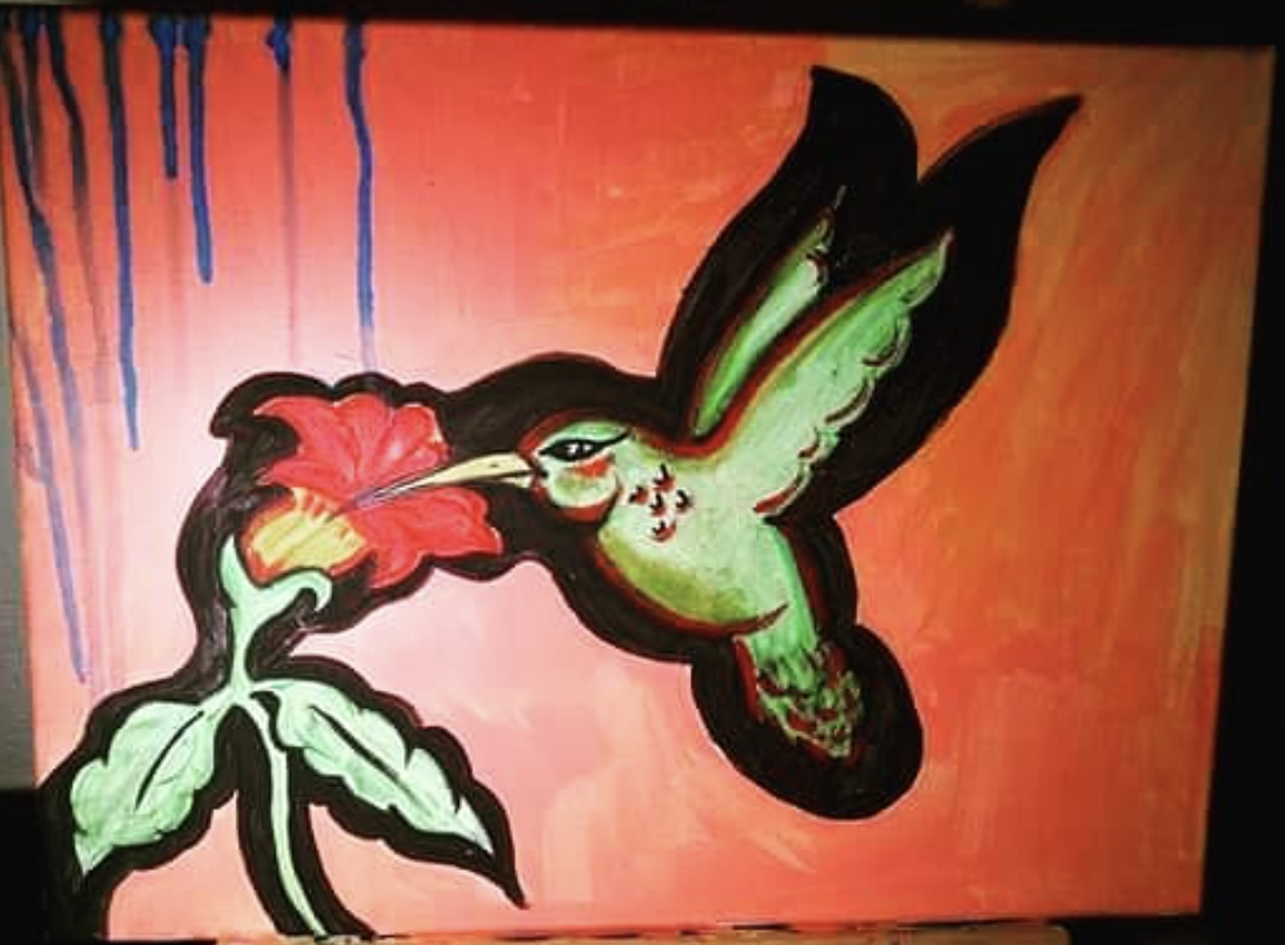 Painting of a hummingbird with green and black feathers, feeding from a red flower with green leaves, set against an orange background with blue drips.