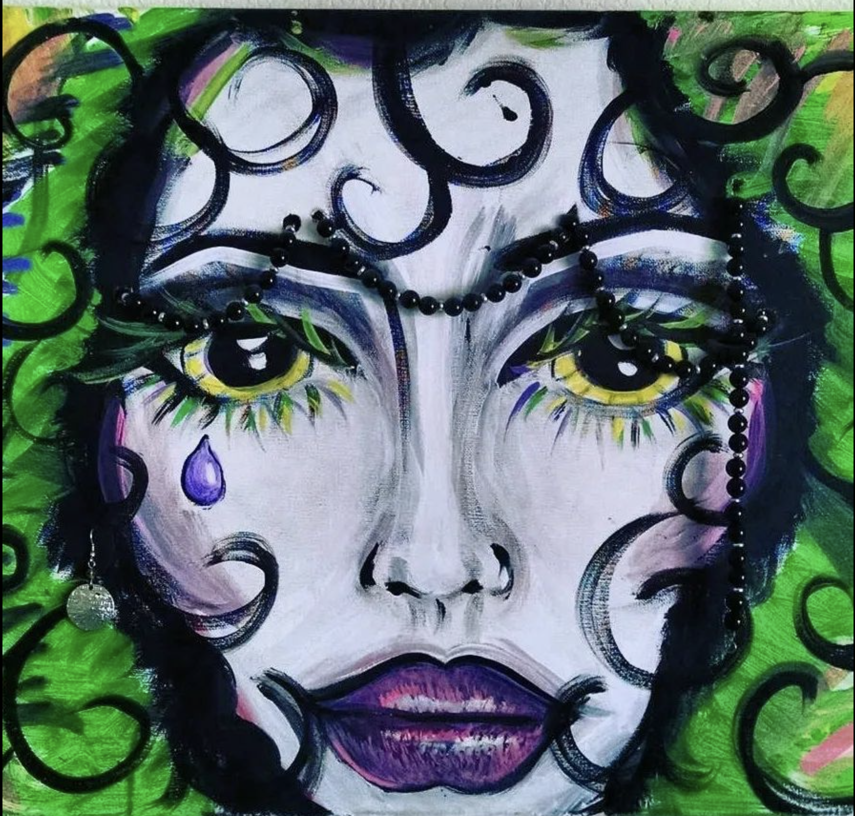 An abstract painting of a woman's face with yellow eyes, purple lips, and colorful accents, surrounded by black swirls and green background.