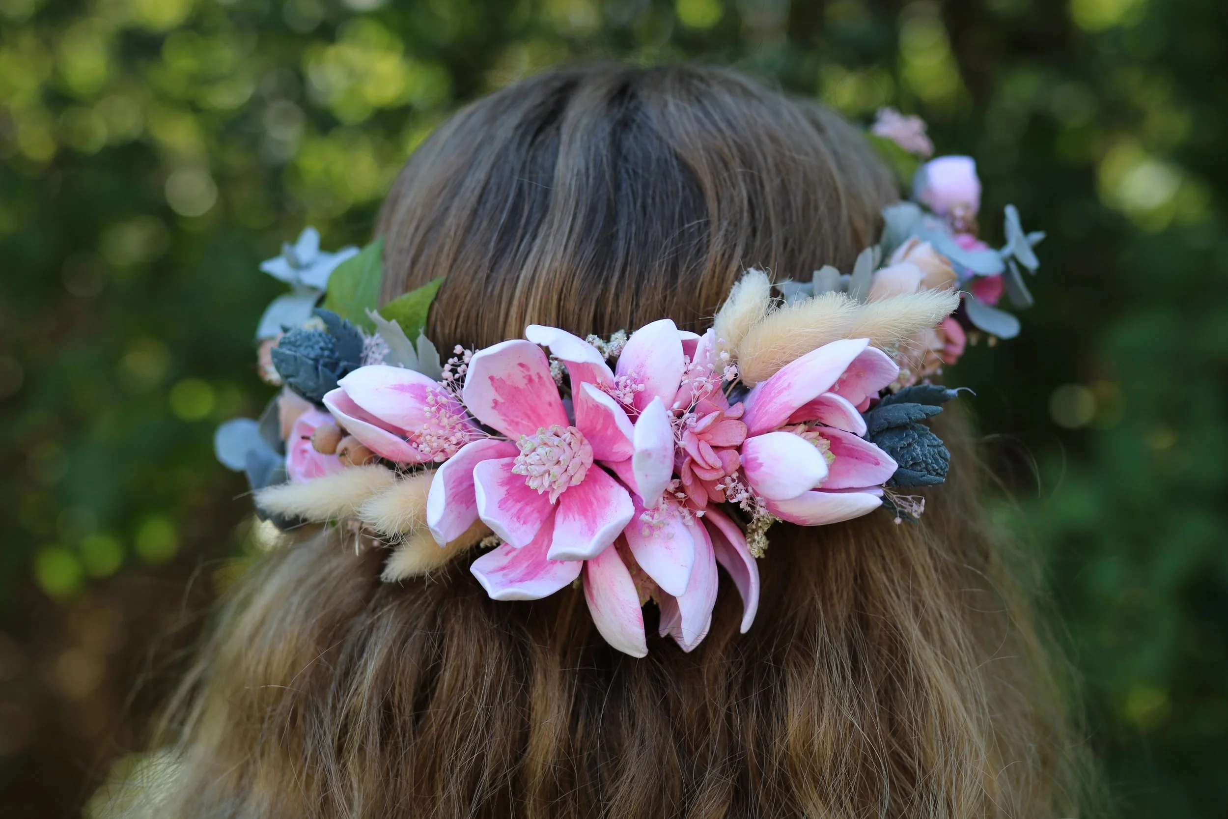 Clay flower hair wreath can be worn with flowers at the back, side or forehead. Pink magnolia floral crown with roses and thistles with greenery. Adjustable for best fit. Everlasting flowers made by hand, petal by petal.