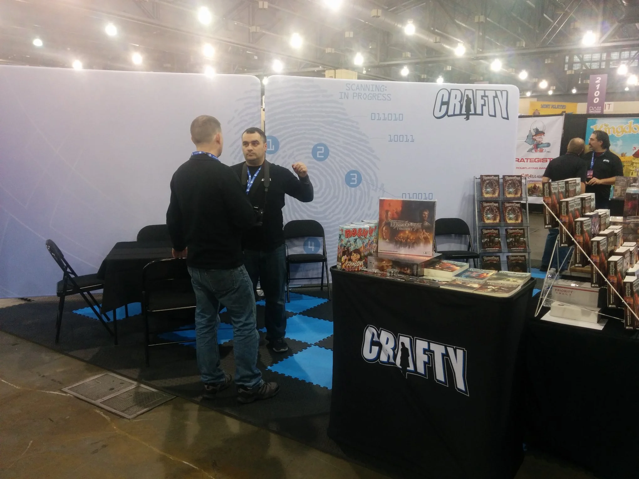 Crafty Games convention booth backdrops and podium.