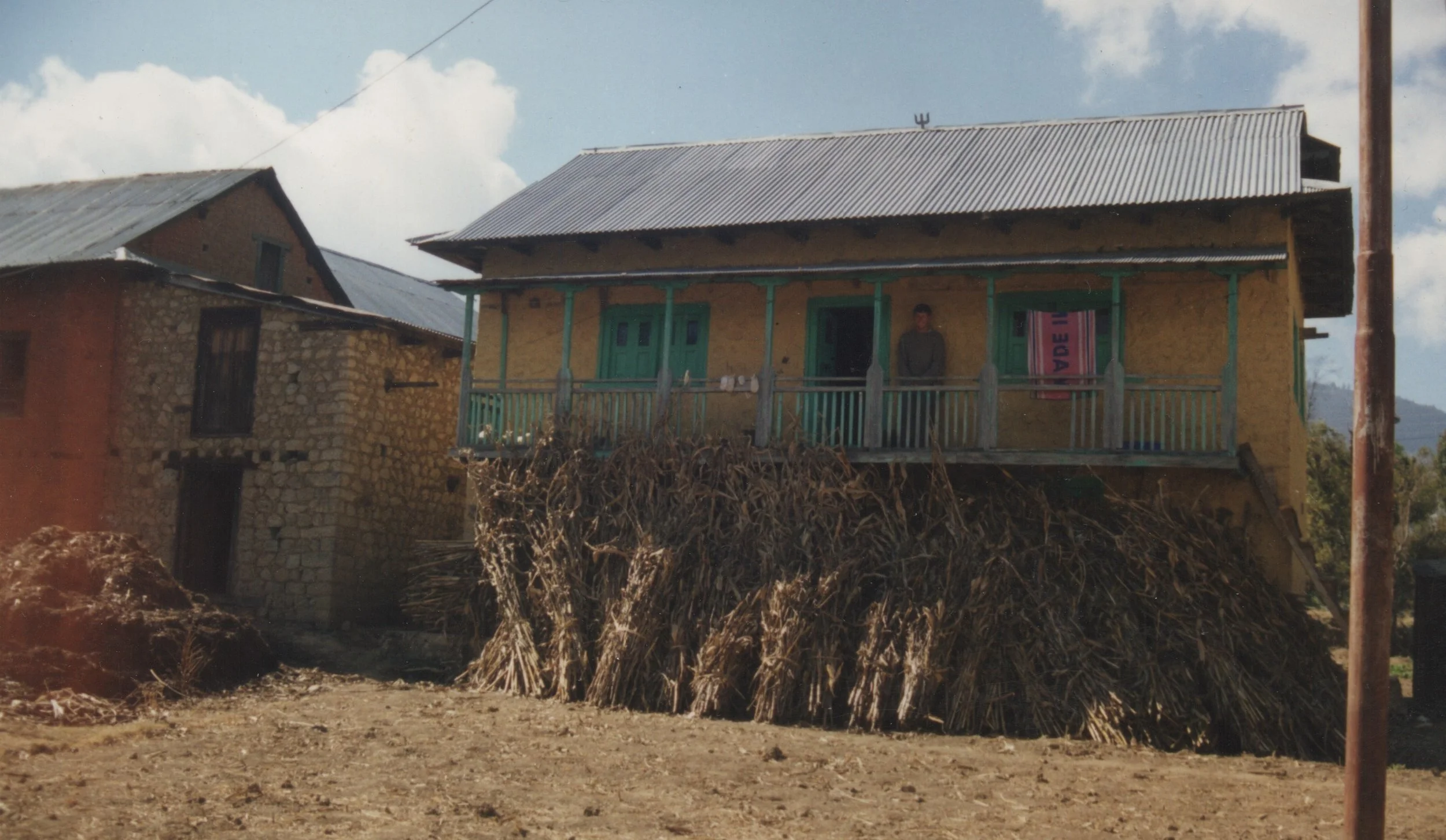 My house. The animals lived on the ground floor, I lived on the second floor, and the third floor was for storing corn.