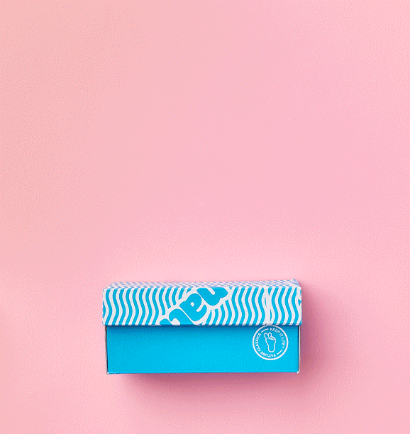 A blue box with a removable lid, placed on a pastel pink background.