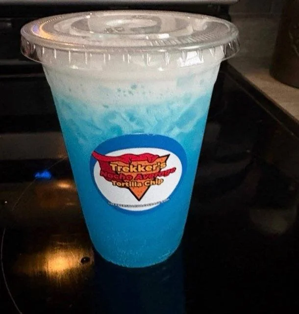 One of Trekker's signature dirty sodas, featuring a blue soda mixed with cream and ice.