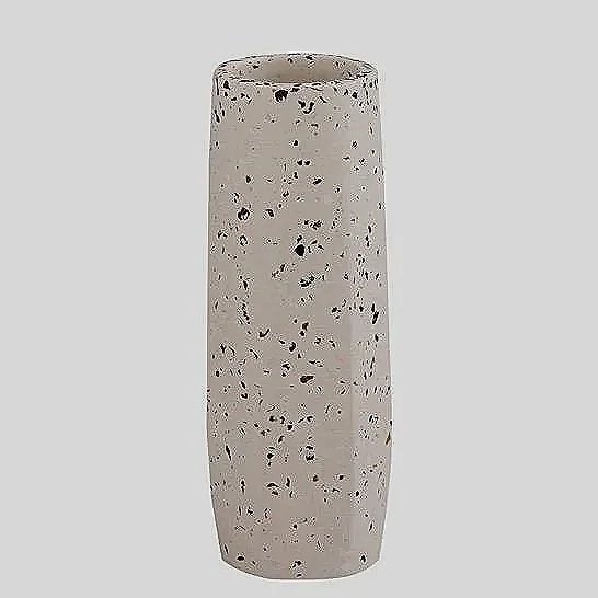 With its handcrafted concrete base and speckled terrazzo finish, this vase reflects that understated European approach to design, where beauty is found in texture, material, and imperfection rather than excess. This design feels right at home in rela