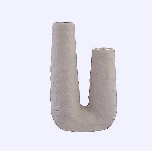 The Salaa Vase adds an earthy, grounded elegance to your home. Its sculptural form feels both raw and refined, inspired by the organic simplicity of homes in Mallorca and the rustic warmth of Tuscany.