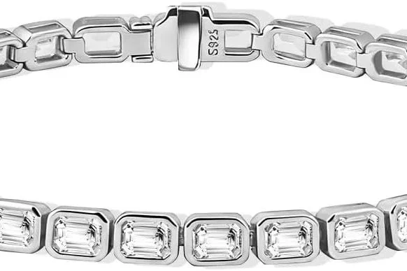 This modern take on the classic tennis bracelet will not break the bank! A refined line of light, softened by form.
Each cubic zirconia is set in a smooth bezel, creating a continuous flow; clean, modern, and quietly luminous.