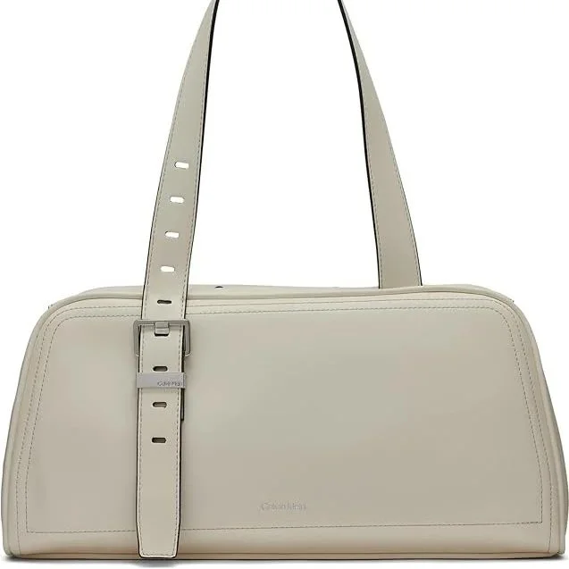 This Calvin Klein Satchel leans into that quiet, architectural simplicity European style does so well. With its elongated silhouette and clean lines, it feels composed rather than decorative. Functional, and refined in its restraint, it is modern min
