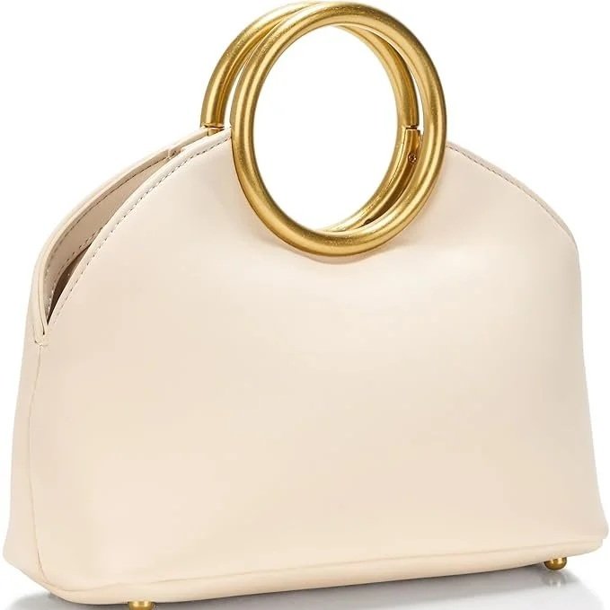 Sleek, structured, and quietly modern, the Vince Camuto Felix TH2 sits in that space where everyday utility meets refined simplicity. It carries that understated "American meets European" ease the brand is known for.