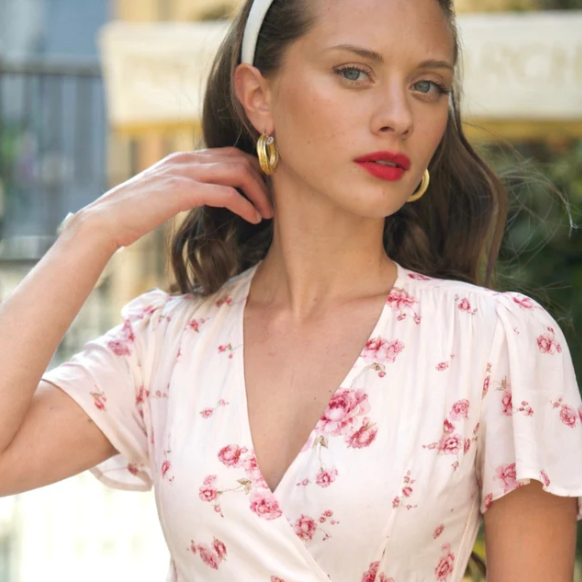 Romance wrapped up: Arlette Wrap Dress.

Crafted from a premium upcycled viscose-rayon blend with a viscose lining, this midi wrap dress features a peony print created by our in-house artisan. It is detailed with petal sleeves, a plunging V-neckline,