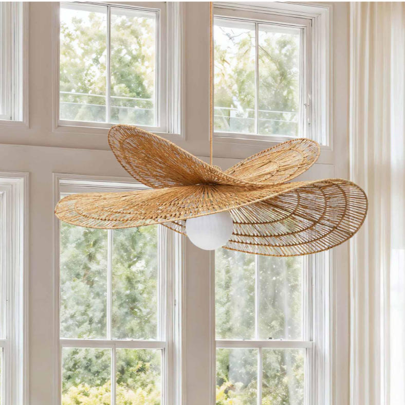 Whisper Leaf Rattan Pendant
An organic pendant featuring wide, hand-woven wings that fan out to create a serene, nature-inspired canopy for any room.