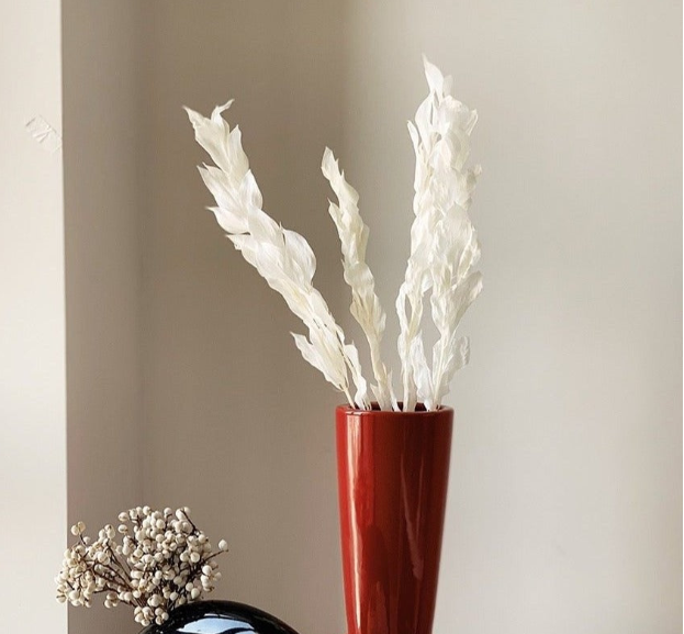 Bauhaus Style Ceramic Art Deco Vase.

Elevate your home decor with this Modern Ceramic Vase in Art Deco Style. Made with high-quality ceramic and featuring a sleek design, this vase is perfect for displaying your favorite flowers or as a standalone p