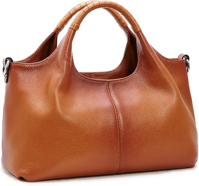 A quietly reliable companion for everyday city rhythm, the Iswee medium satchel is crafted in genuine leather with a softly structured silhouette. Spacious enough for daily essentials, yet composed enough to maintain a polished line. Designed with un