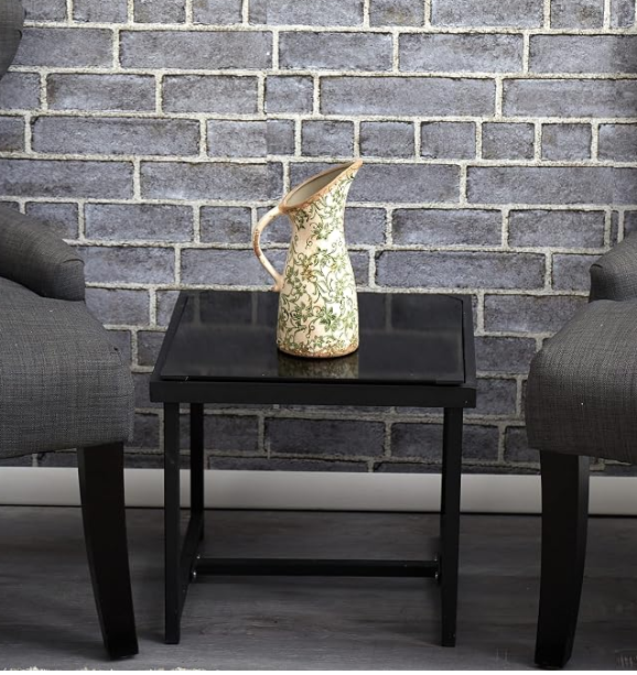 Inspired by the rustic beauty of the Italian countryside, this Tuscan ceramic pitcher vase brings warmth and timeless character to any space. Its soft green glaze and hand-painted scrollwork evoke the charm of artisan pottery, making it a beautiful a