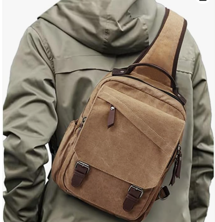 Compact, practical, and effortlessly European. This canvas sling bag keeps everyday essentials close without the bulk, giving a man a clean silhouette and a confident, hands-free way to carry what he needs. Perfect for city days, travel, and everyday