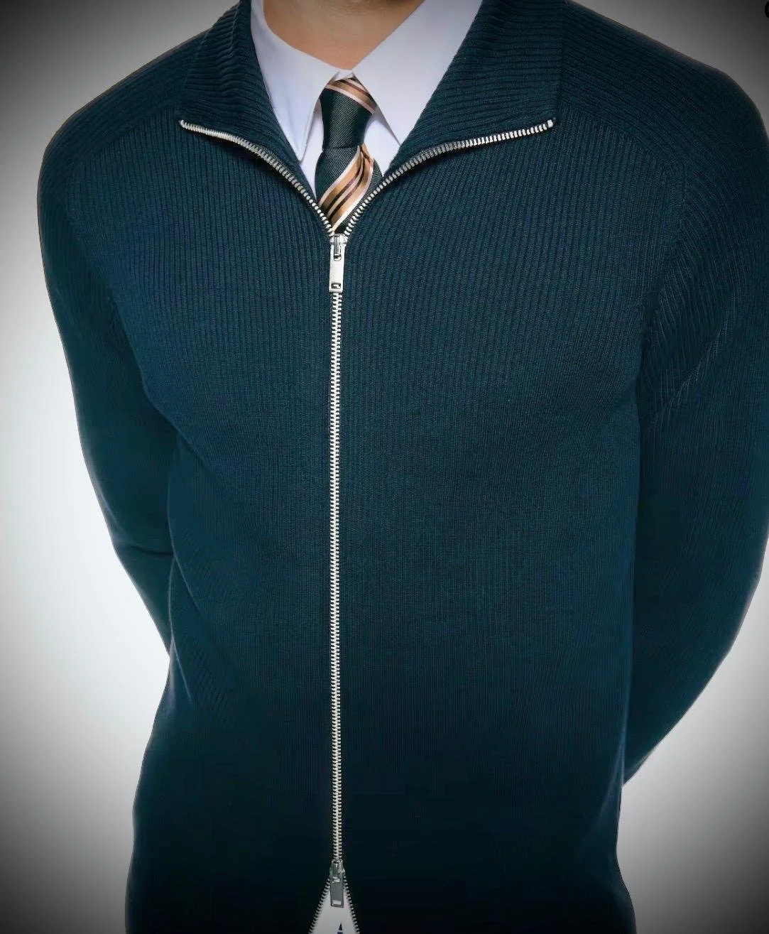 A refined staple rooted in European style, this slim-fit rib-knit cardigan in deep navy offers a clean, tailored silhouette without feeling restrictive. The subtle rib texture adds structure and depth, making it an easy layer over a shirt or a simple