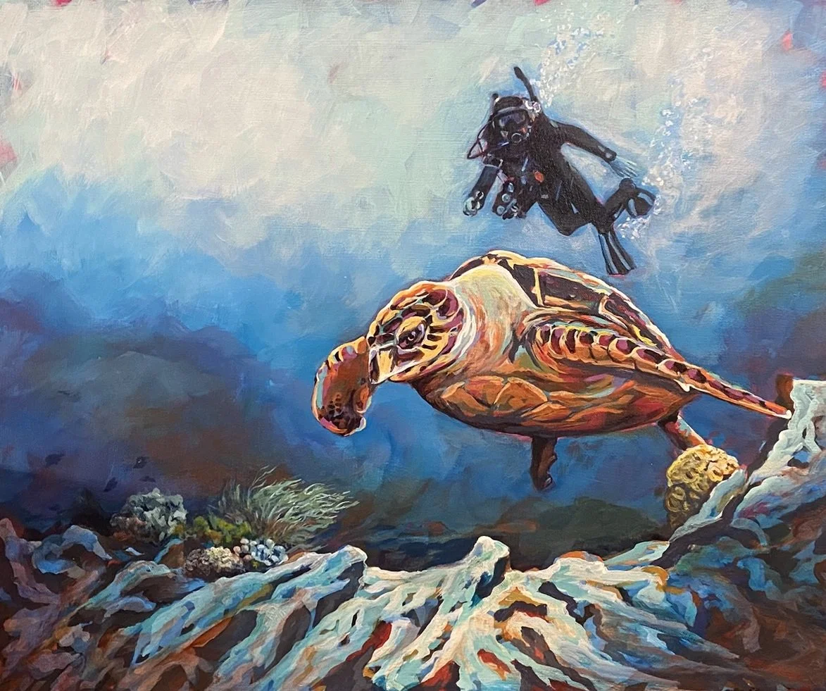 A painting of a scuba diver swimming above a sea turtle near the ocean floor with coral and rocks.