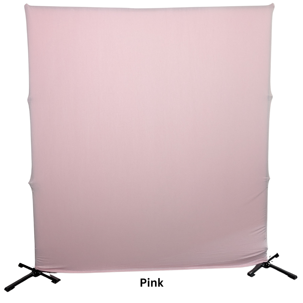 A large pink fabric backdrop on a black metal frame stand.