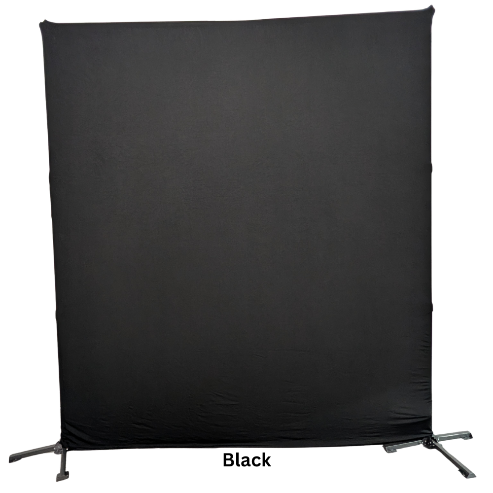 A large black fabric background or backdrop on a stand with metal legs.