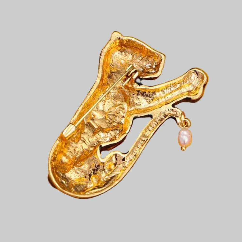 Back view of black leopard brooch