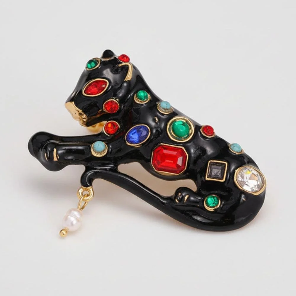 Black leopard brooch accented with colorful gemstones