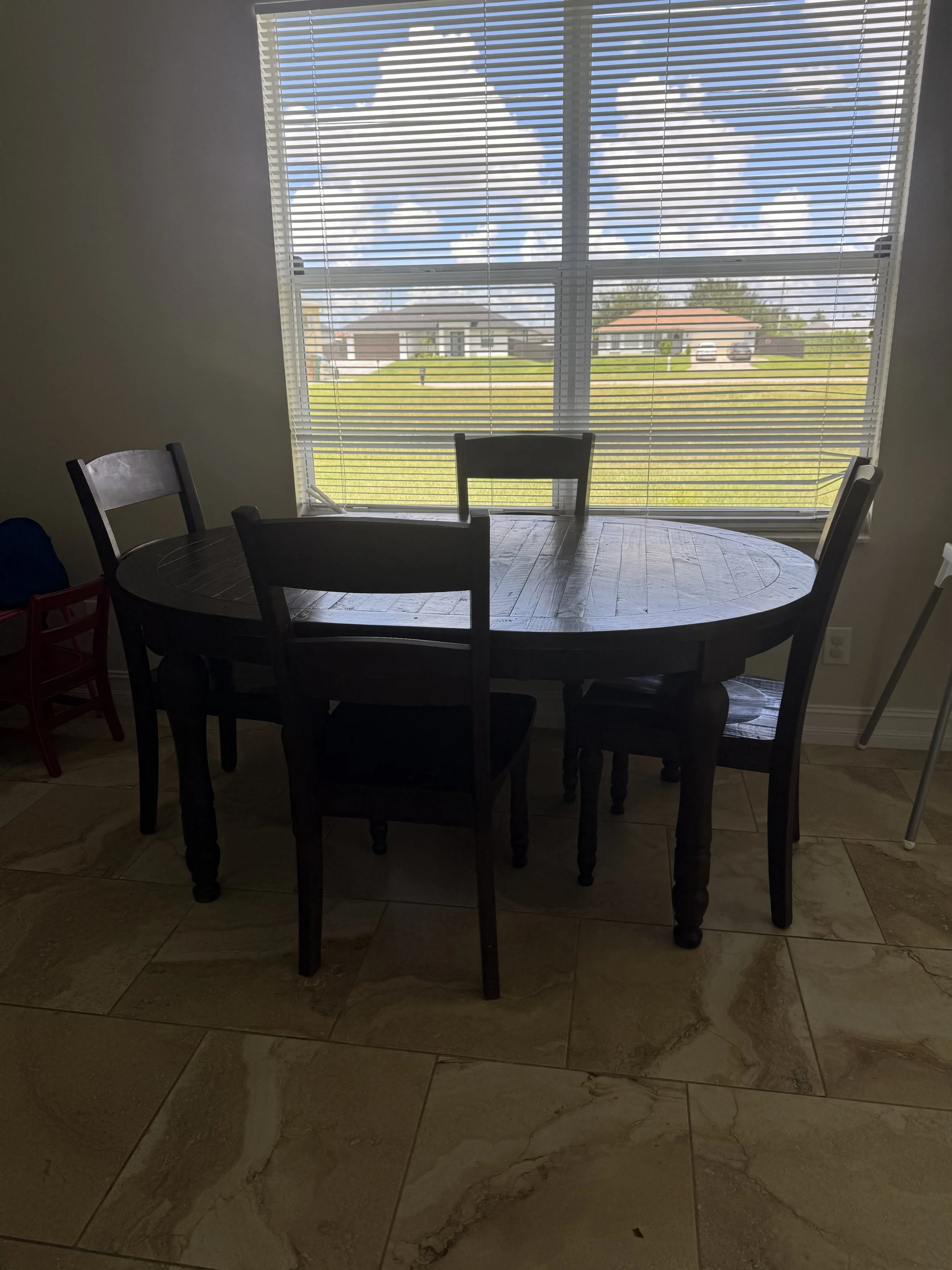 We prioritized what mattered most: getting her family back around the dinner table. By decluttering and creating a functional, welcoming space, we lifted one more source of stress from her plate and gave her family a place to slow down, reconnect, an